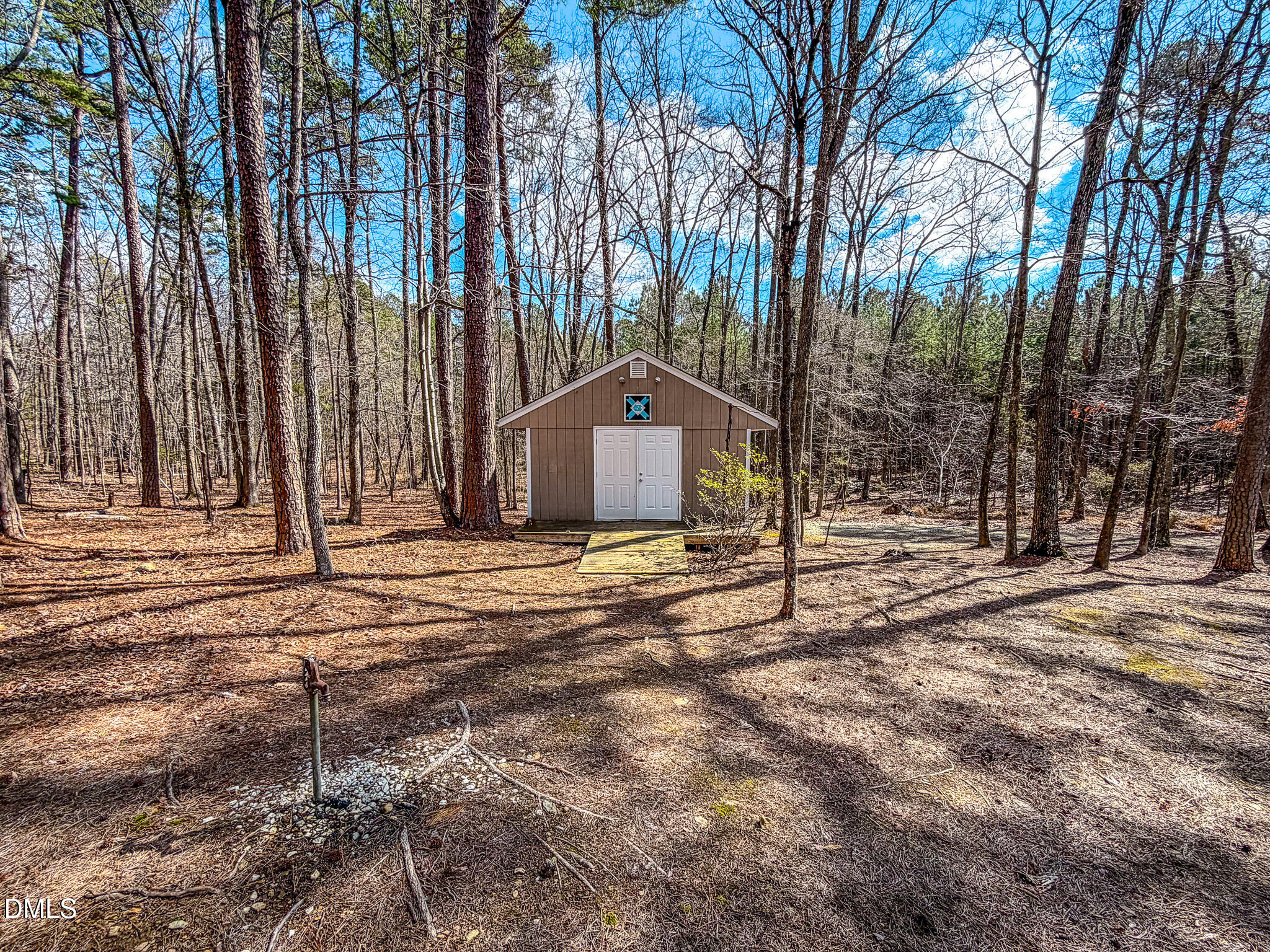 202 Equestrian Chase Rougemont, NC 27572 - Photo 9 of 54 a house with trees in front of it