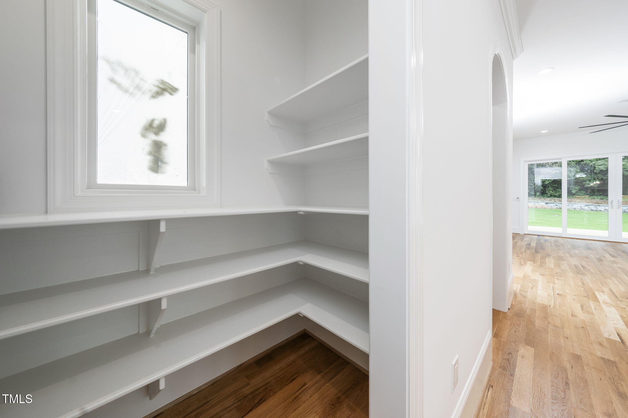 1330 Duplin Road Raleigh, NC 27607 - Photo 16 of 53 a view of walk in closet with empty racks