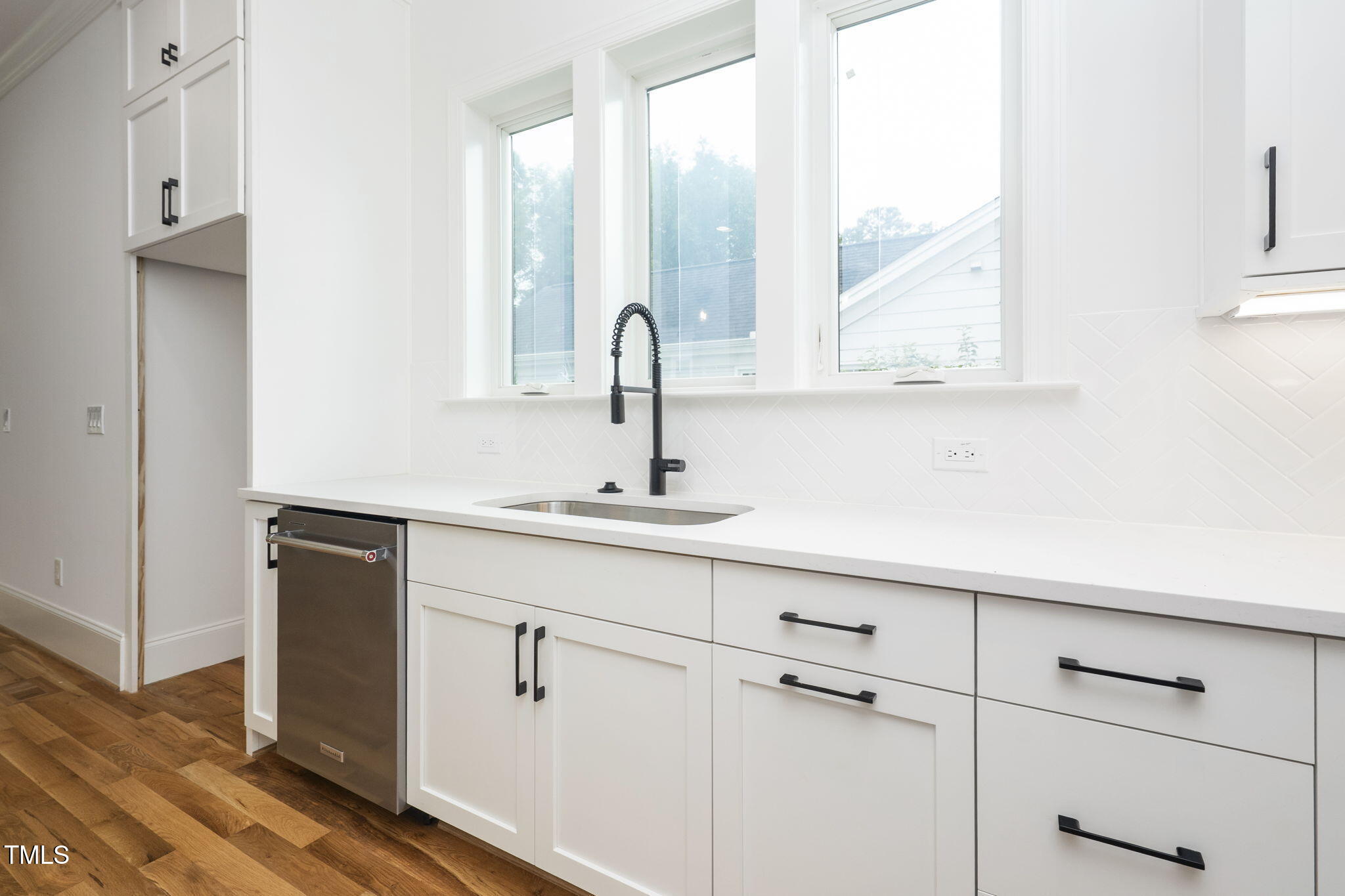 1330 Duplin Road Raleigh, NC 27607 - Photo 22 of 53 a bathroom with a sink and a mirror
