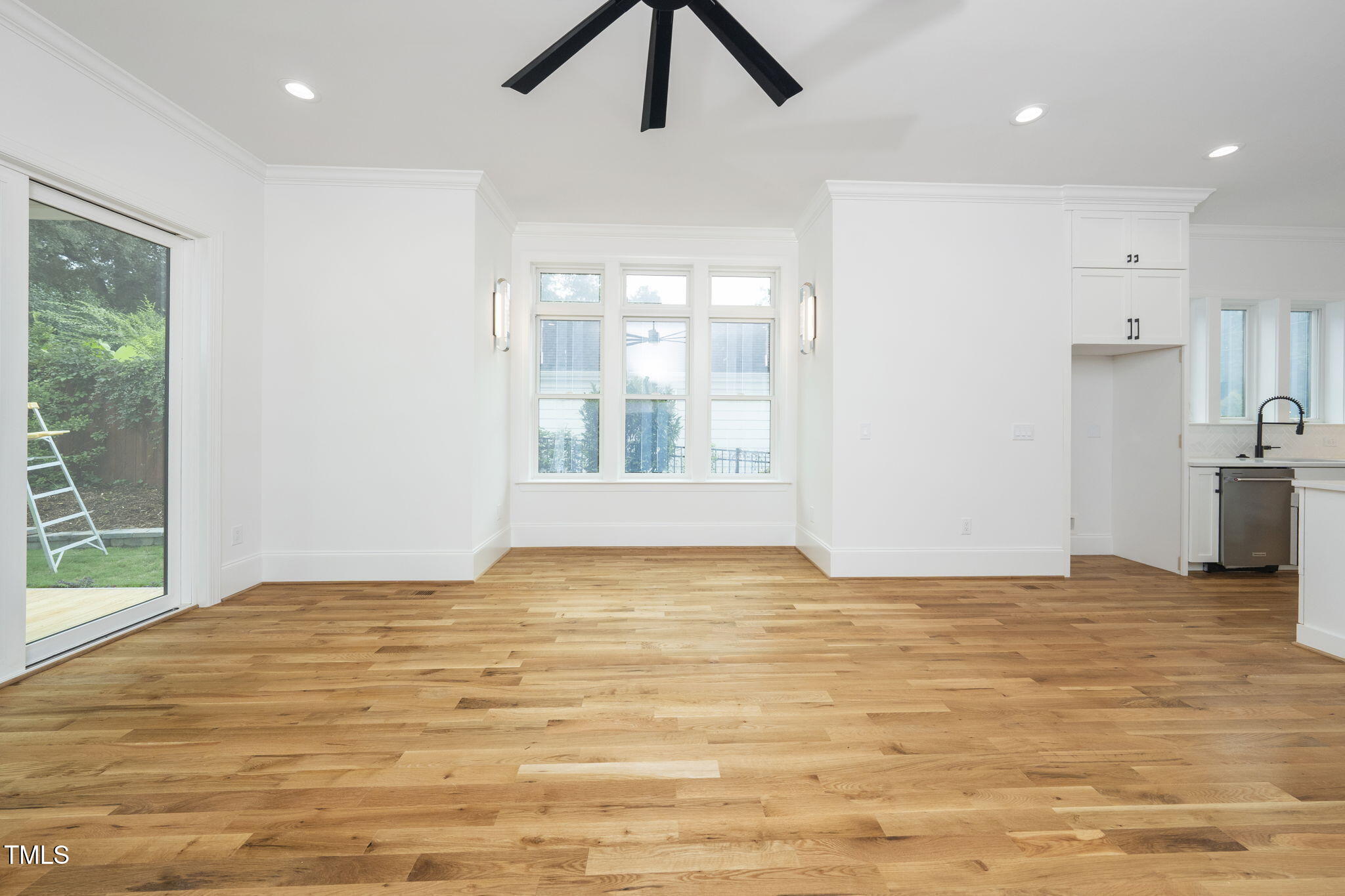 1330 Duplin Road Raleigh, NC 27607 - Photo 30 of 53 a view of an empty room with window and wooden floor