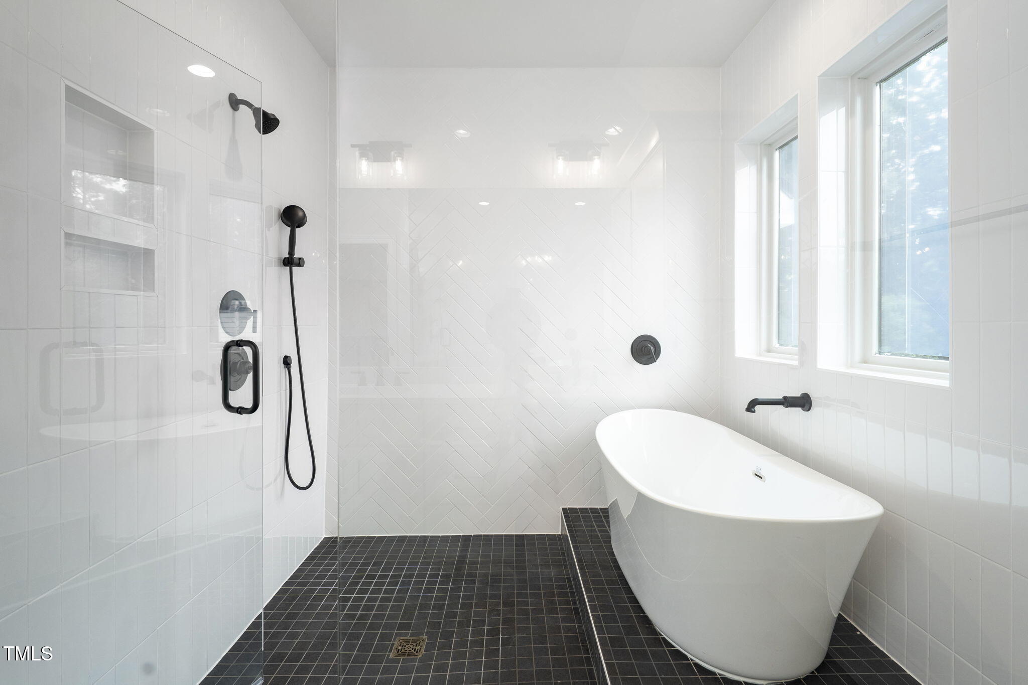 1330 Duplin Road Raleigh, NC 27607 - Photo 39 of 53 a bathroom with a sink and a mirror