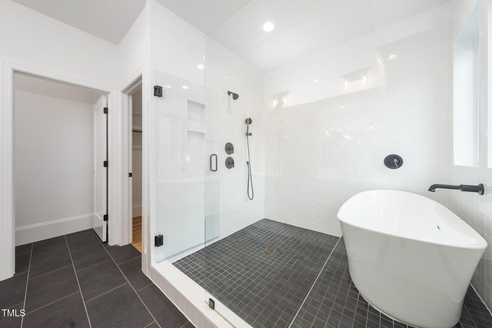 1330 Duplin Road Raleigh, NC 27607 - Photo 42 of 53 a bathroom with a sink a toilet and shower