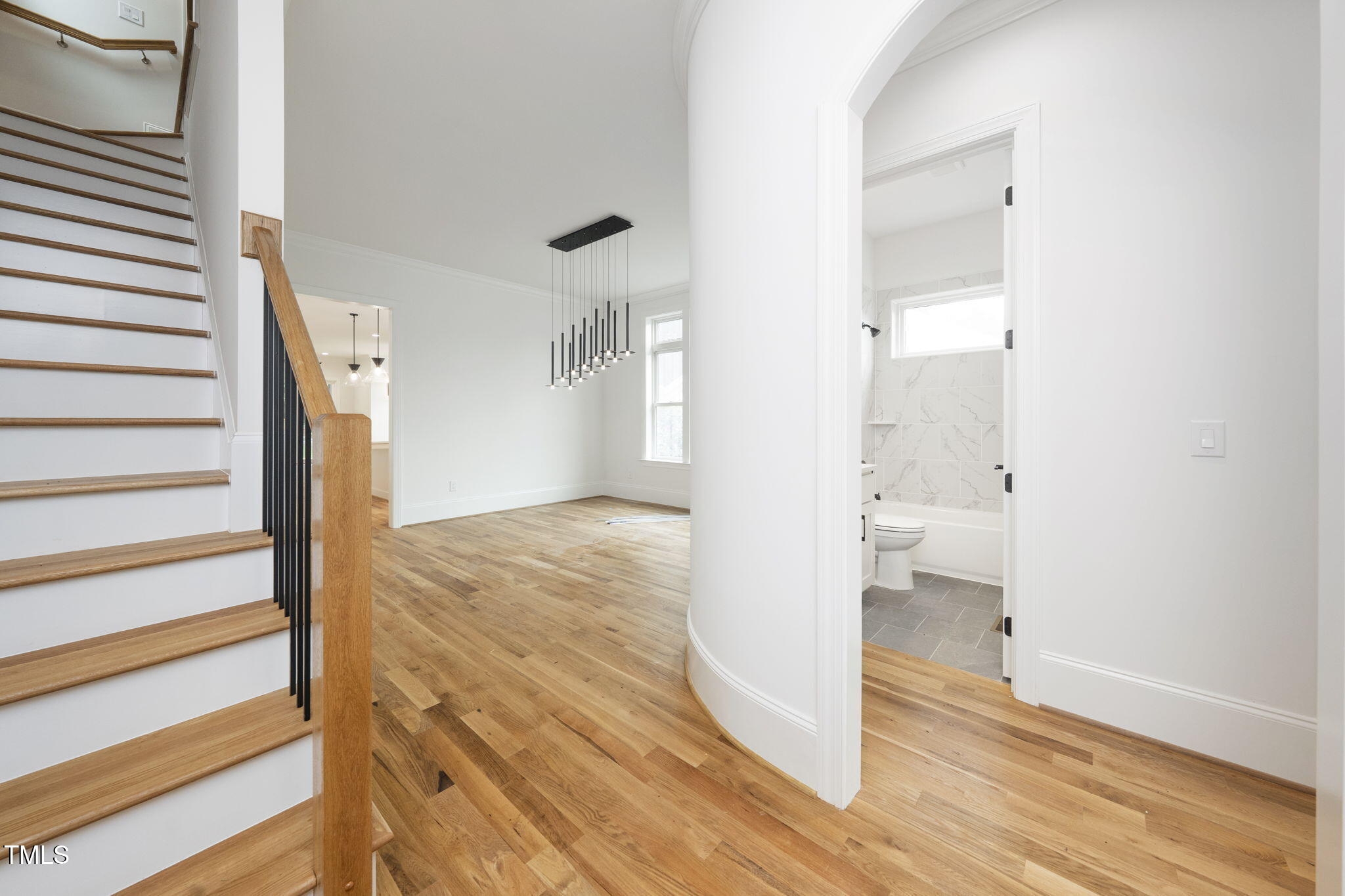 1330 Duplin Road Raleigh, NC 27607 - Photo 9 of 53 a view of a bathroom from a hallway
