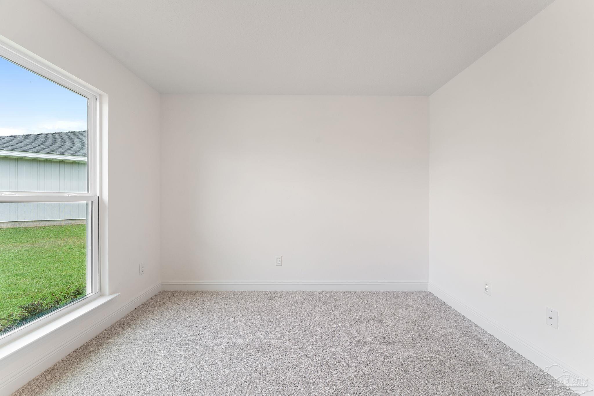 4930 East Spencer Field Road Pace, FL 32571 - Photo 14 of 28 a view of an empty room