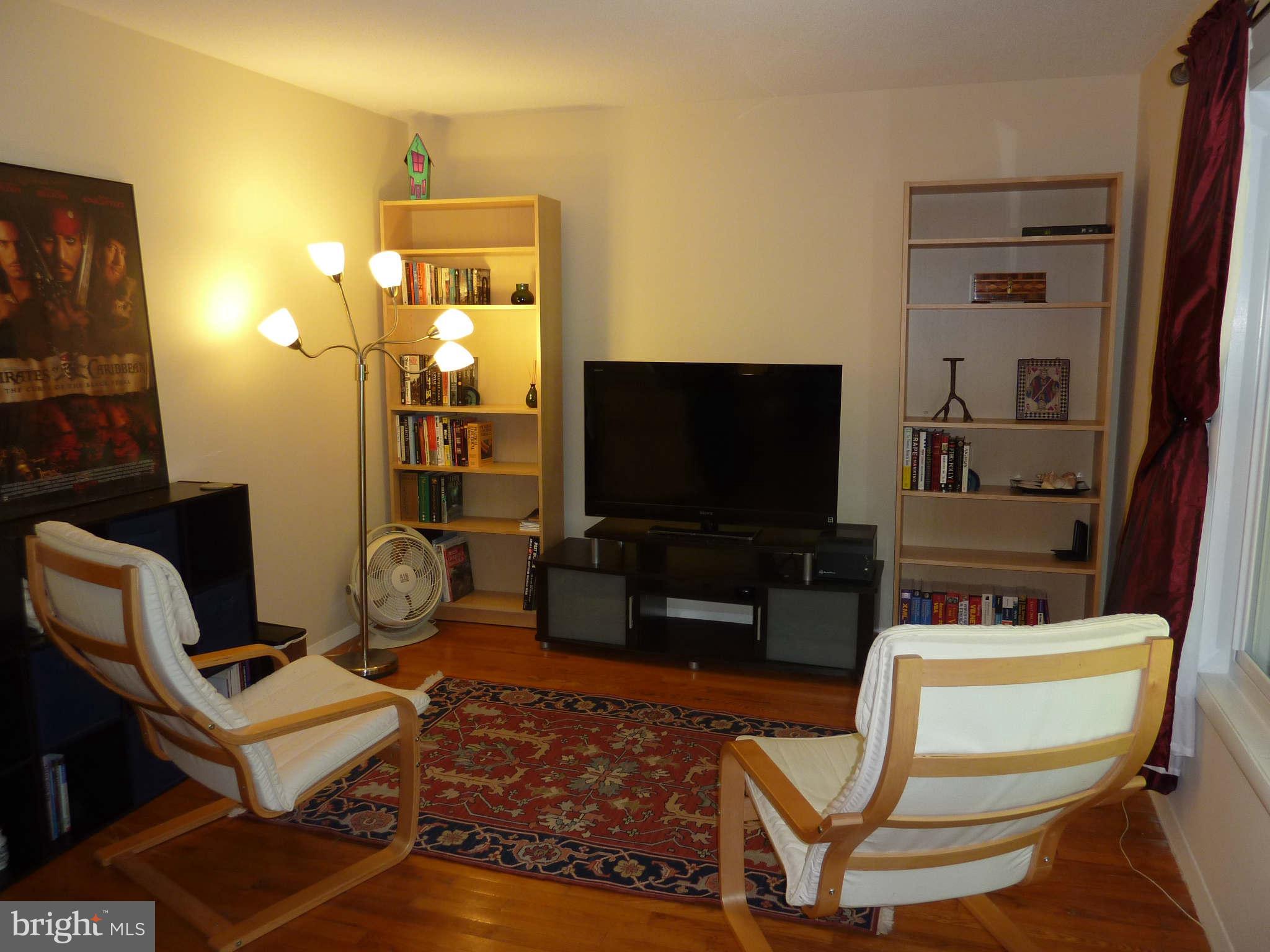 1304 Northgate Square Reston, VA 20190 - Photo 12 of 23 Bedroom #2 with hardwood floors & large window