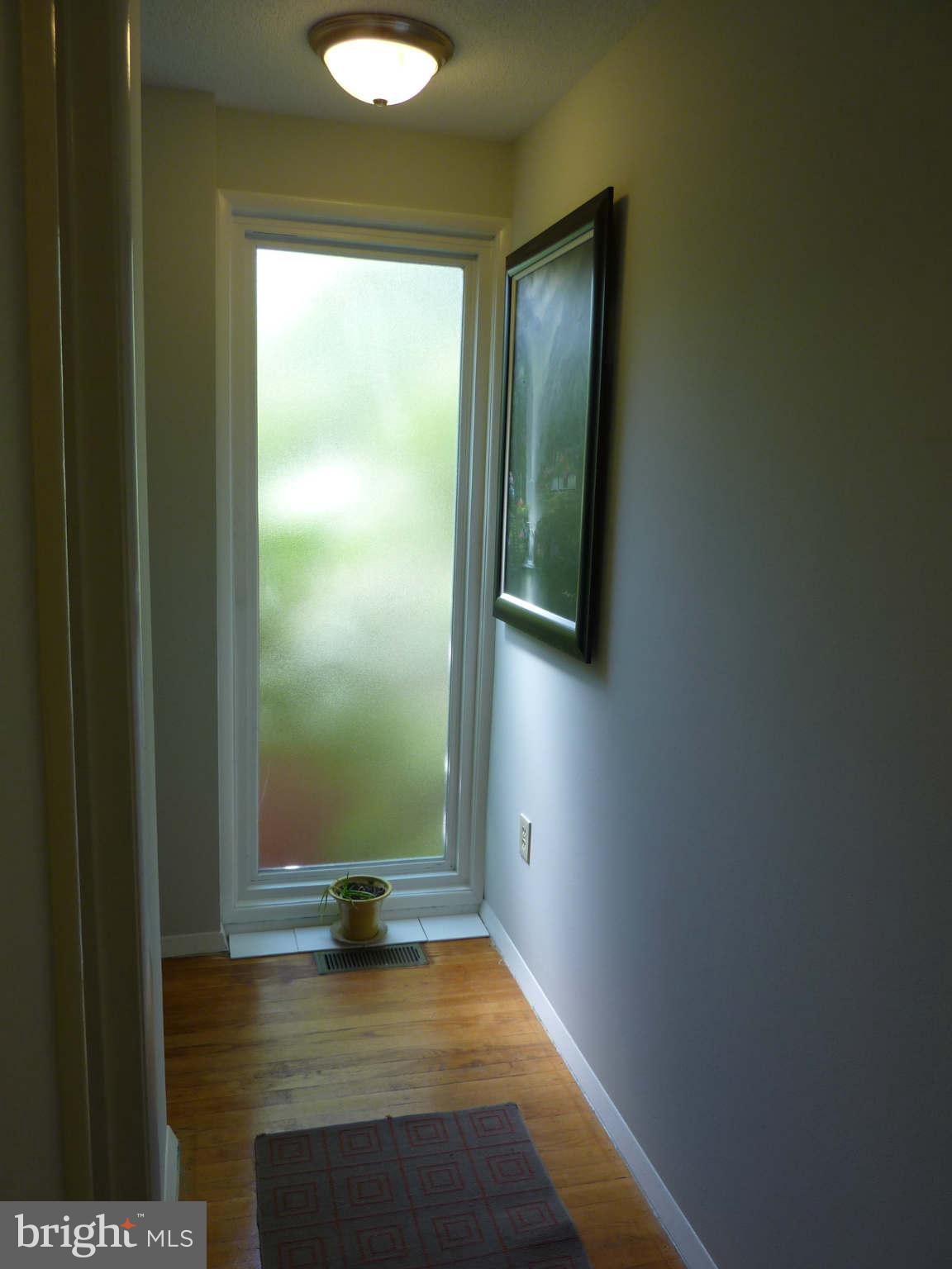 1304 Northgate Square Reston, VA 20190 - Photo 15 of 23 Upper hall has full length frosted glass window