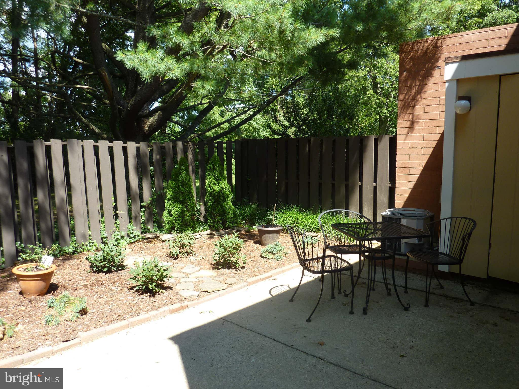 1304 Northgate Square Reston, VA 20190 - Photo 16 of 23 Large fenced yard with storage shed