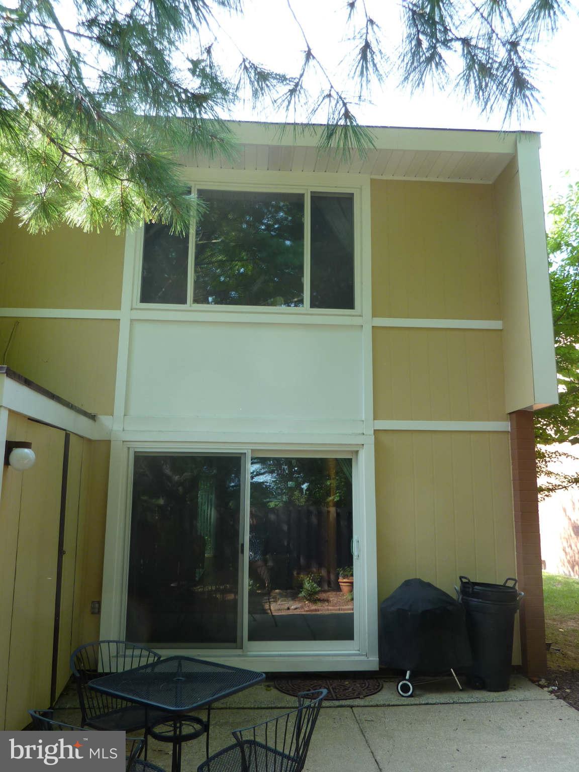 1304 Northgate Square Reston, VA 20190 - Photo 19 of 23 Rear view: Hardiplank siding & replaced windows