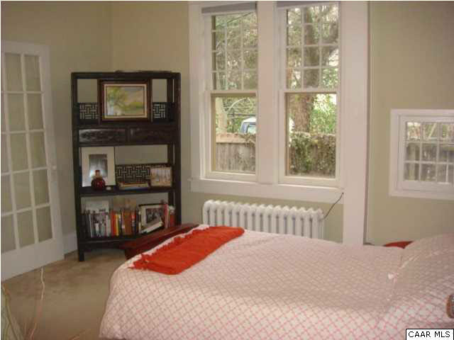 1934 Lewis Mountain Road Charlottesville, VA 22903 - Photo 12 of 32 Bedroom 2 - main floor. Note the original windows, especially the tiny one on the far right of this photo.