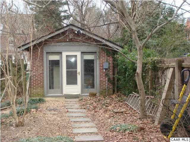 1934 Lewis Mountain Road Charlottesville, VA 22903 - Photo 27 of 32 In a corner of the back yard, there is a small brick structure, probably c. 1923. It has exposed beams, electricity, heating, and cooling.