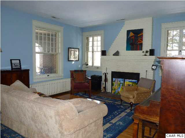 1934 Lewis Mountain Road Charlottesville, VA 22903 - Photo 5 of 32 The Living Room has lovely windows and an interesting brick fireplace (called an inglenook in its day).