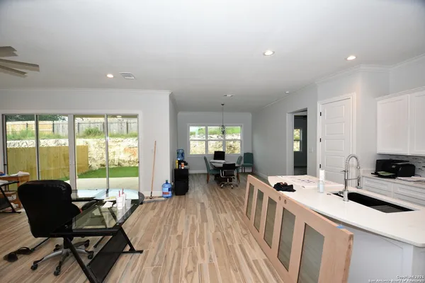 a view of a dining room with furniture window and outside view
