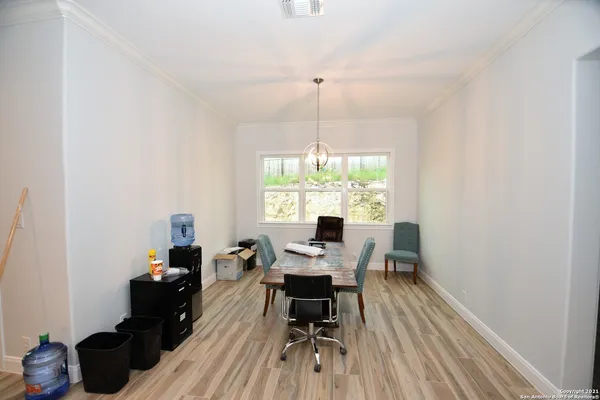 a workspace with wooden floor