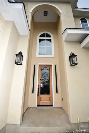 a view of a door to ceiling window