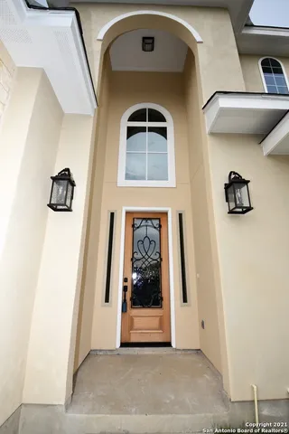 a view of a door to ceiling window