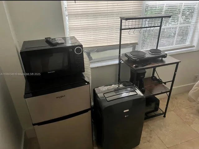 a utility room with washer and dryer