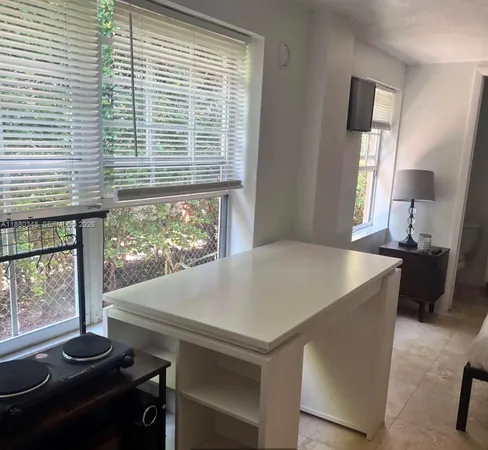 a living room with a large window