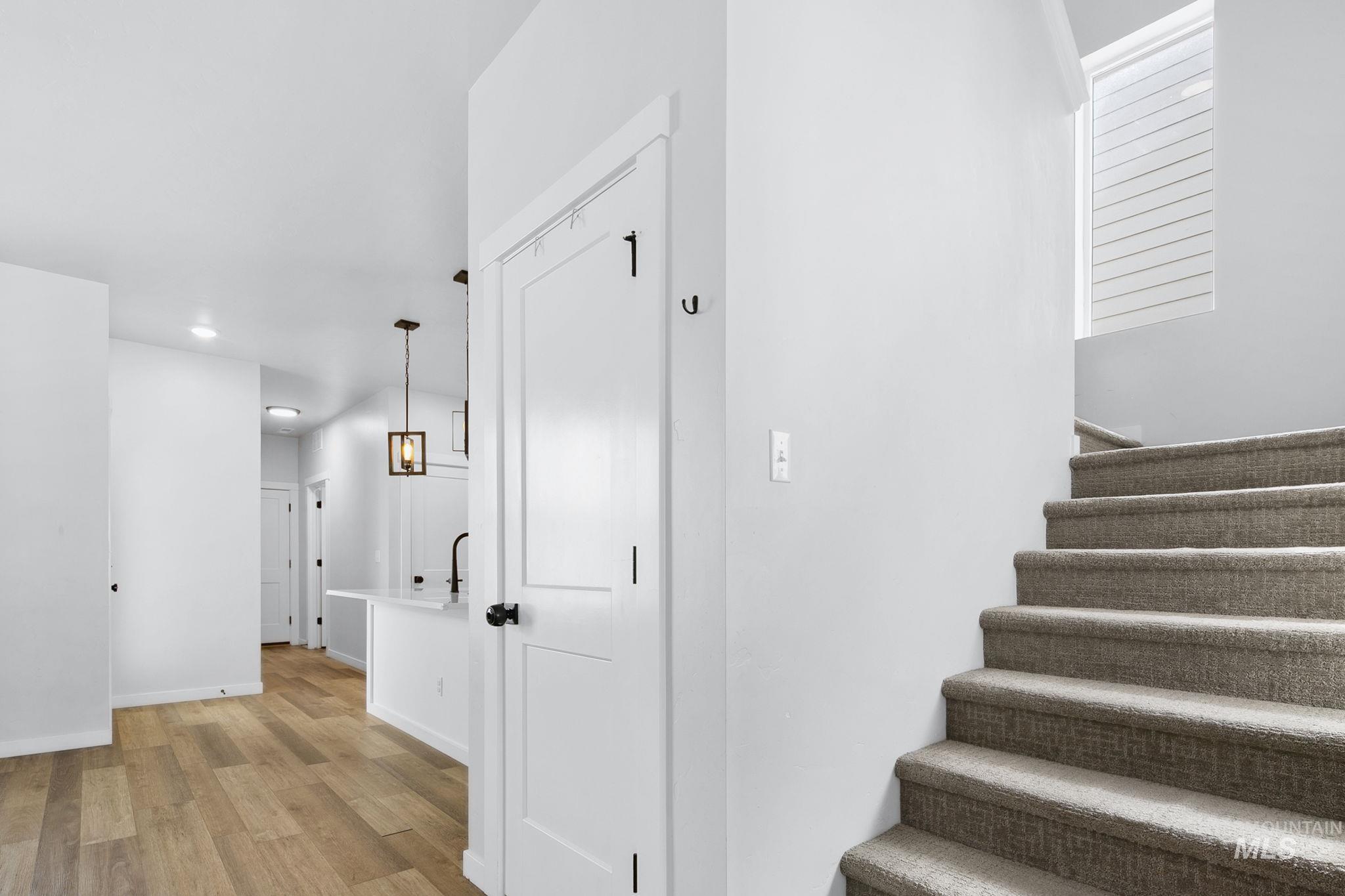 298 South Fritts Avenue Meridian, ID 83642 - Photo 15 of 32 Stairway with wood finished floors and recessed lighting