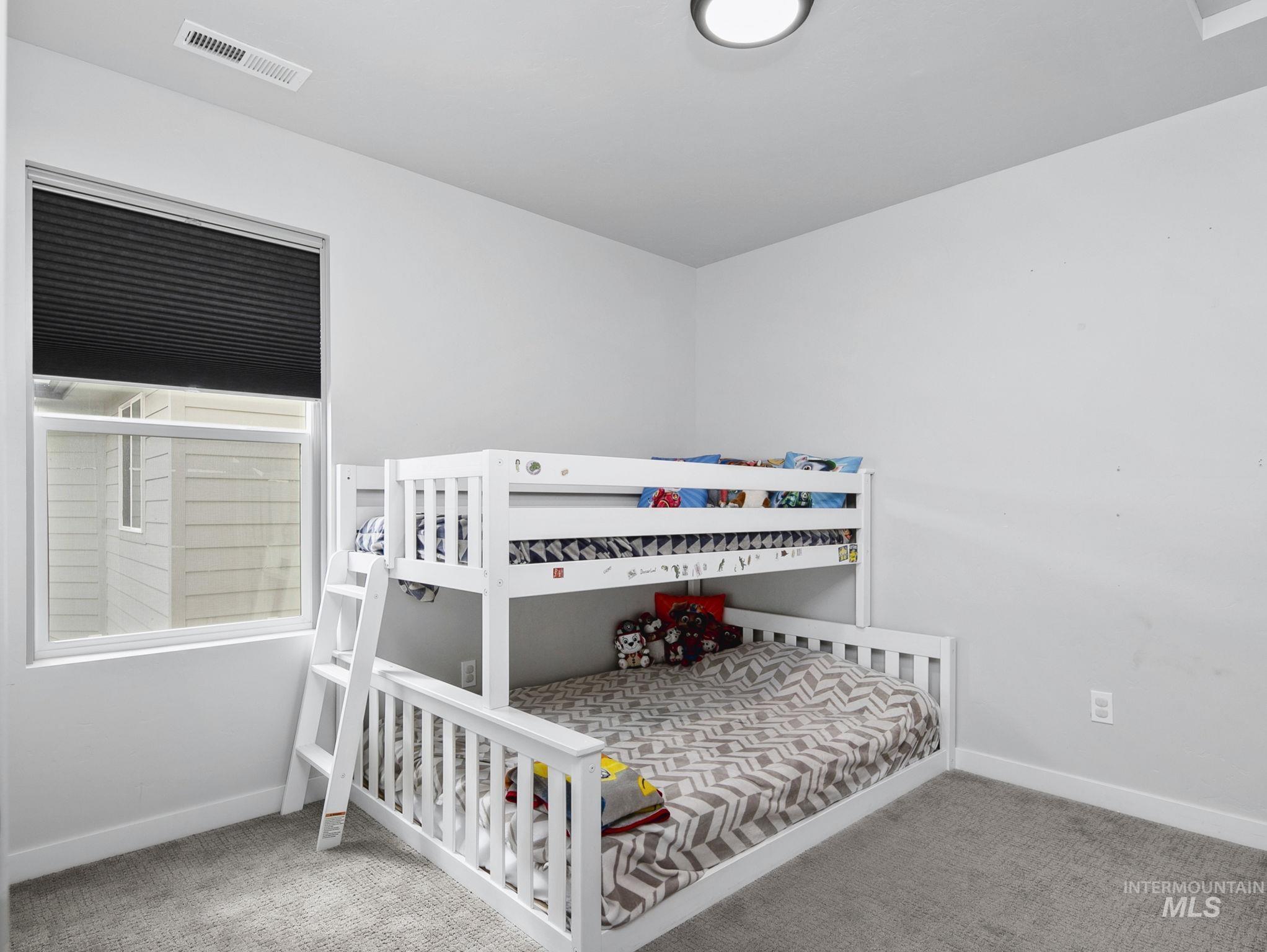 298 South Fritts Avenue Meridian, ID 83642 - Photo 23 of 32 Bedroom with light carpet