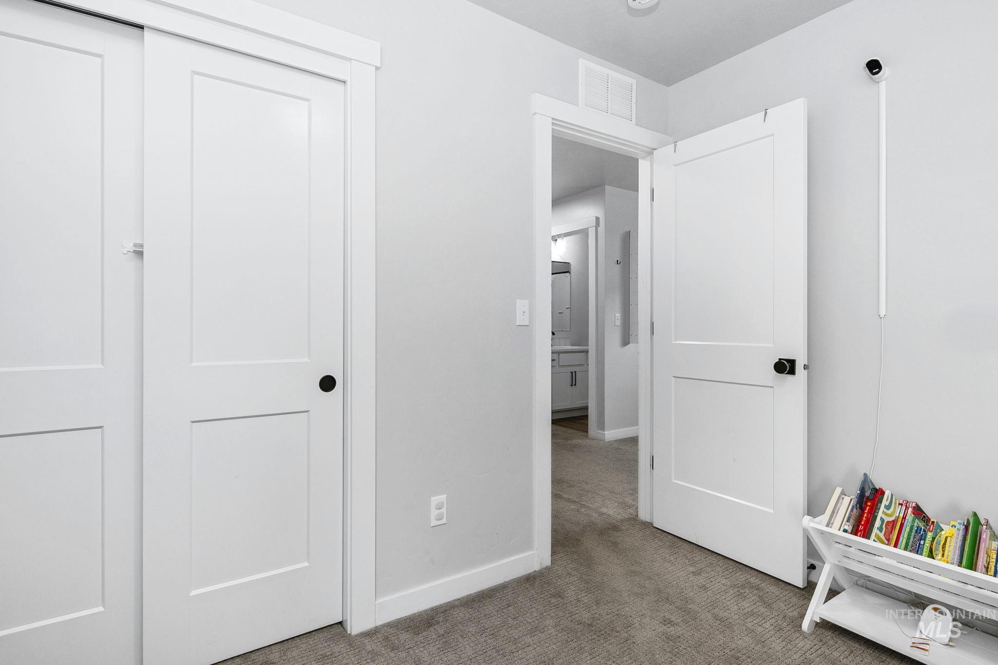 298 South Fritts Avenue Meridian, ID 83642 - Photo 26 of 32 Bedroom featuring carpet flooring and a closet