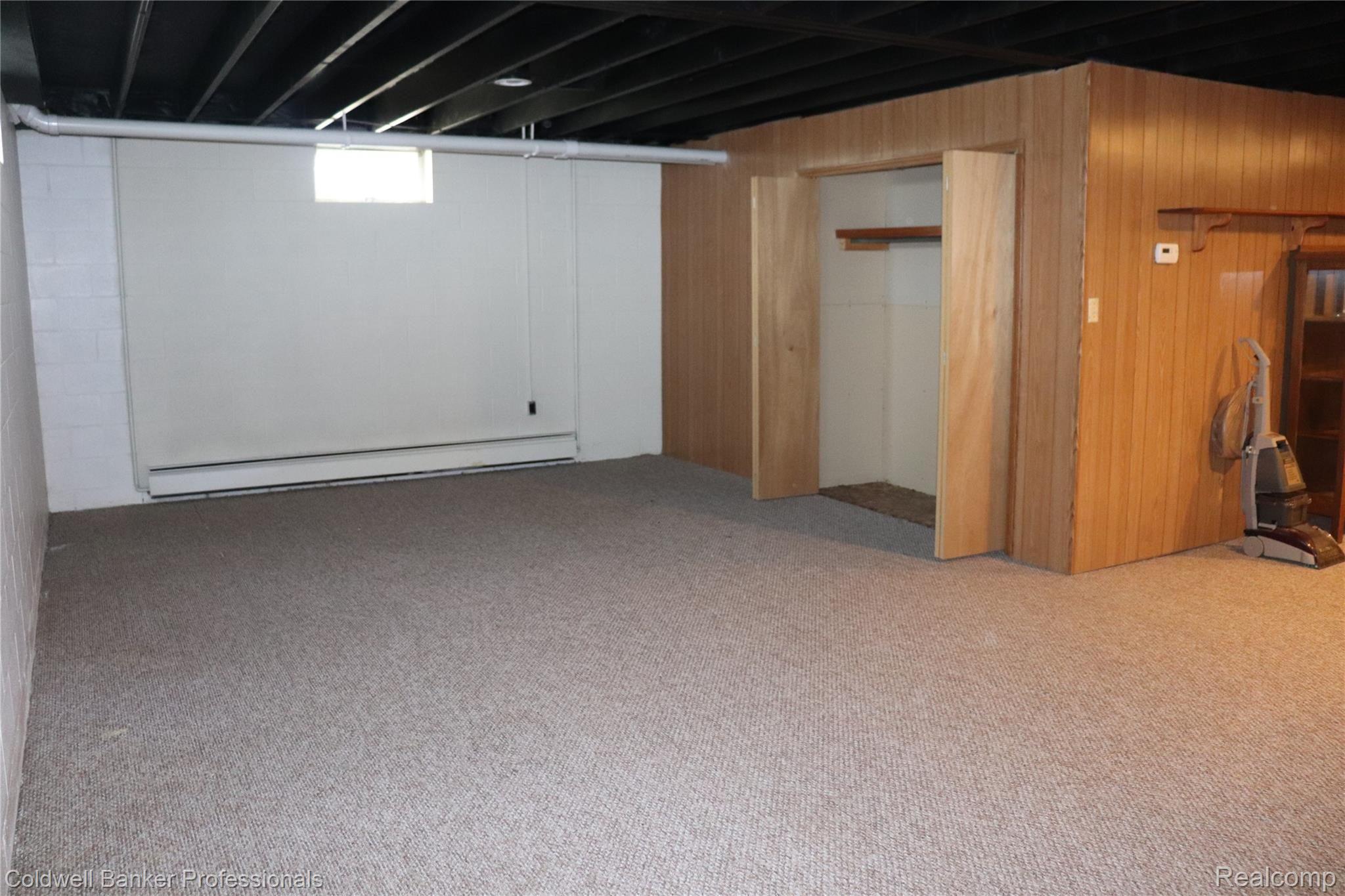4934 Casey Road Dryden, MI 48428 - Photo 24 of 40 PARTIALLY FINISHED LIVING AREA IN BASEMENT