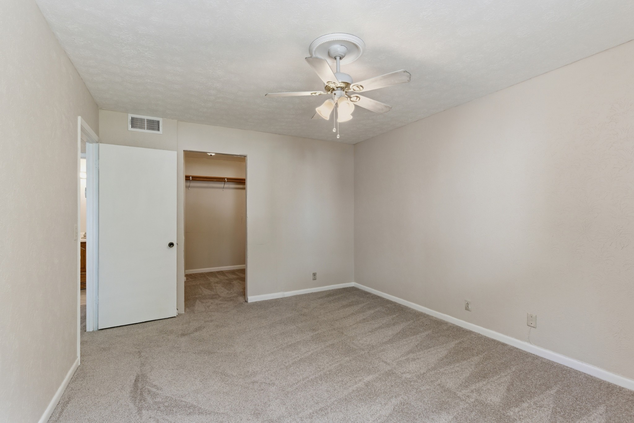 810 Bellevue Road, Unit 202 Nashville, TN 37221 - Photo 13 of 17 an empty room with a fan & a window