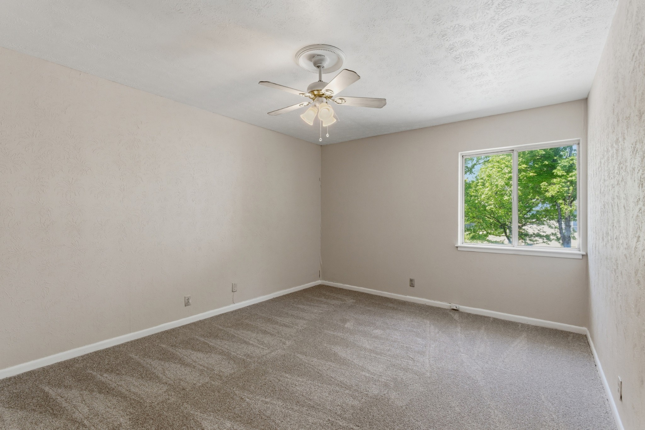 810 Bellevue Road, Unit 202 Nashville, TN 37221 - Photo 14 of 17 an empty room with a window and a fan