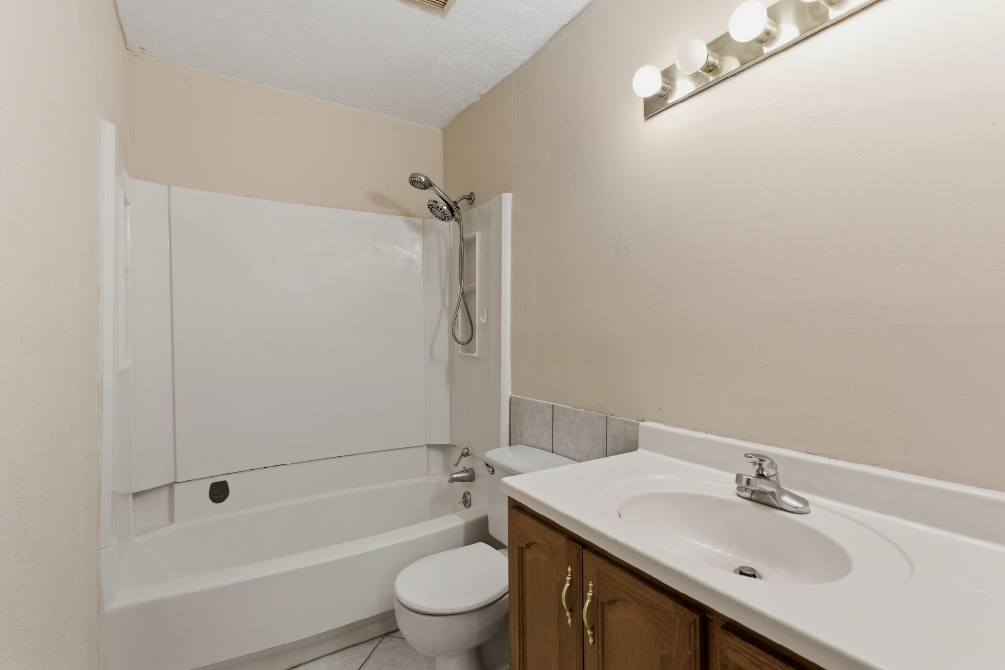 810 Bellevue Road, Unit 202 Nashville, TN 37221 - Photo 15 of 17 a bathroom with a sink toilet and shower