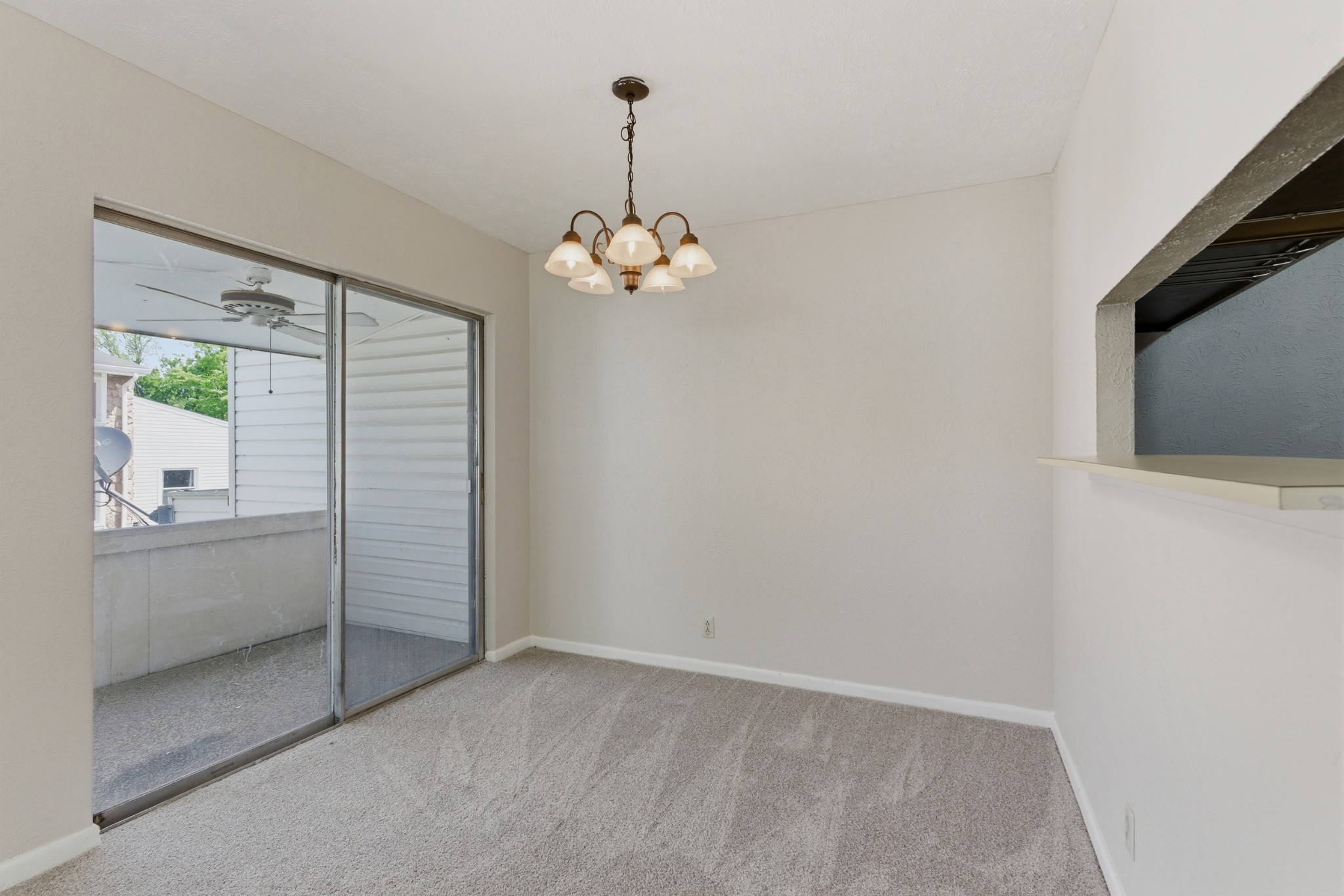 810 Bellevue Road, Unit 202 Nashville, TN 37221 - Photo 6 of 17 a view of a livingroom with a chandelier fan and fire place