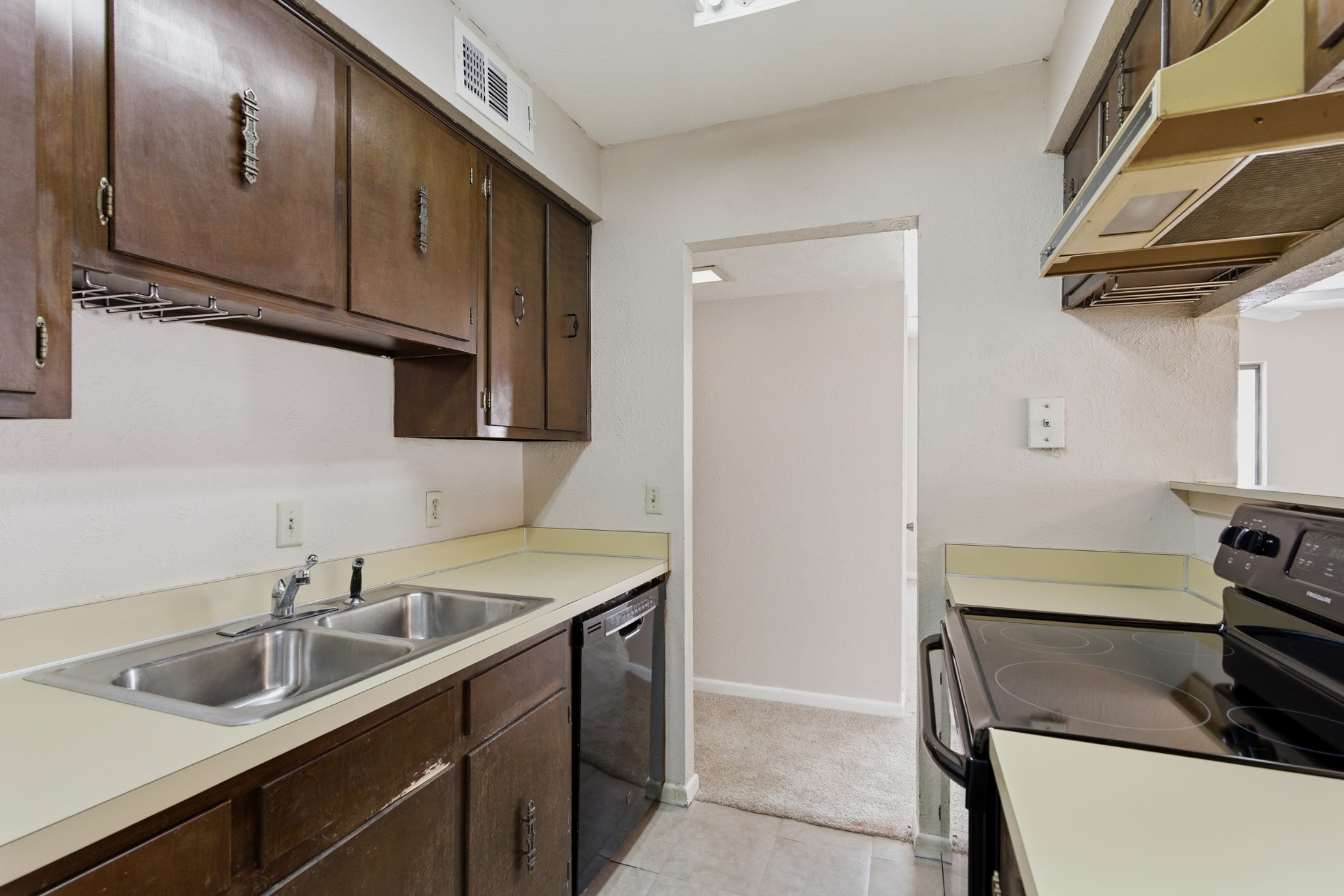 810 Bellevue Road, Unit 202 Nashville, TN 37221 - Photo 9 of 17 a kitchen with stainless steel appliances granite countertop a sink and a stove