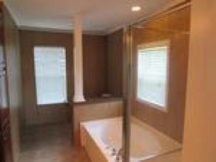 93 Harbin Road Fayetteville, TN 37334 - Photo 4 of 9 a bathroom with a bathtub