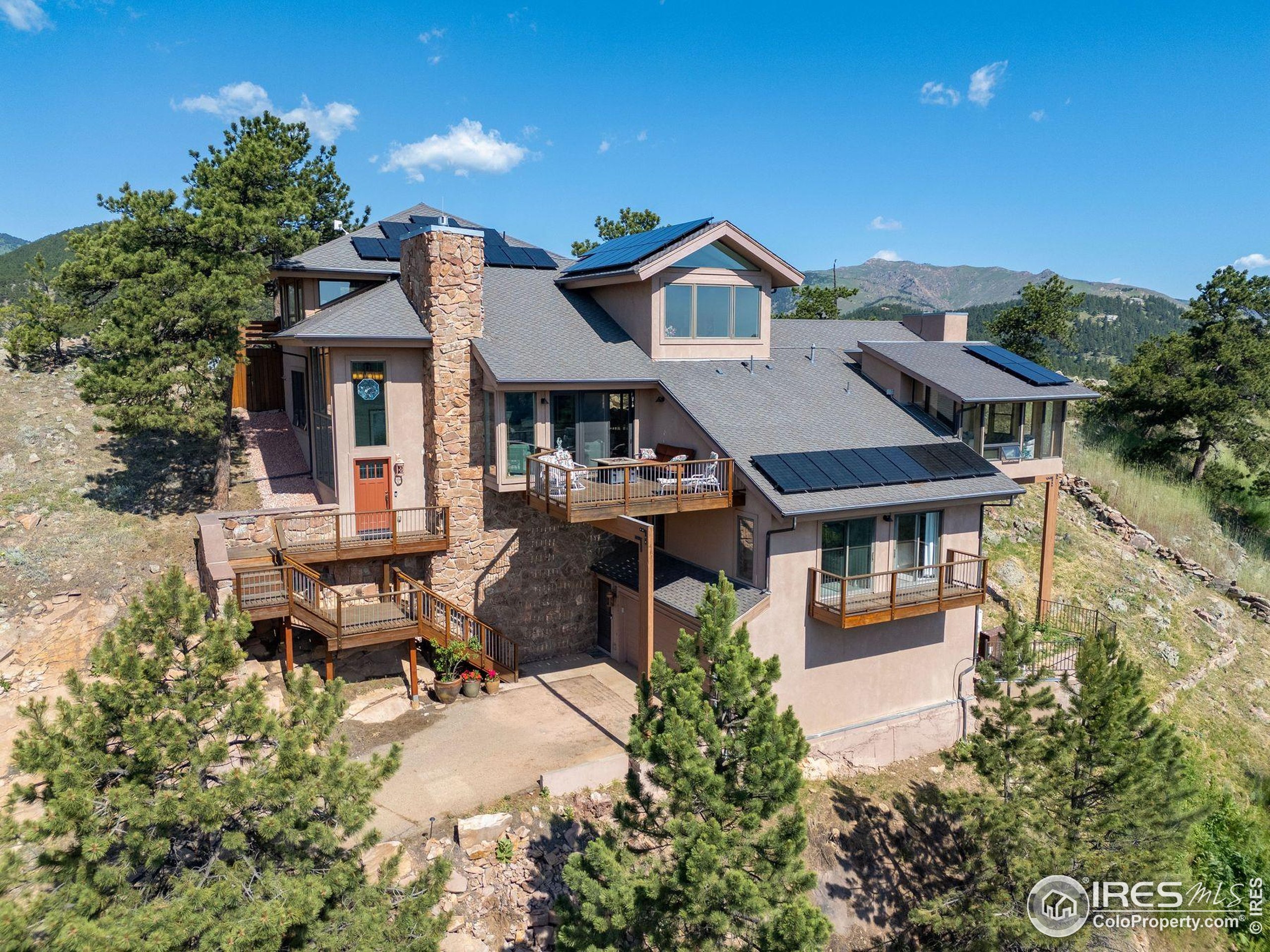 6183 Red Hill Road Boulder, CO 80302 - Photo 1 of 34 an aerial view of a house with a yard