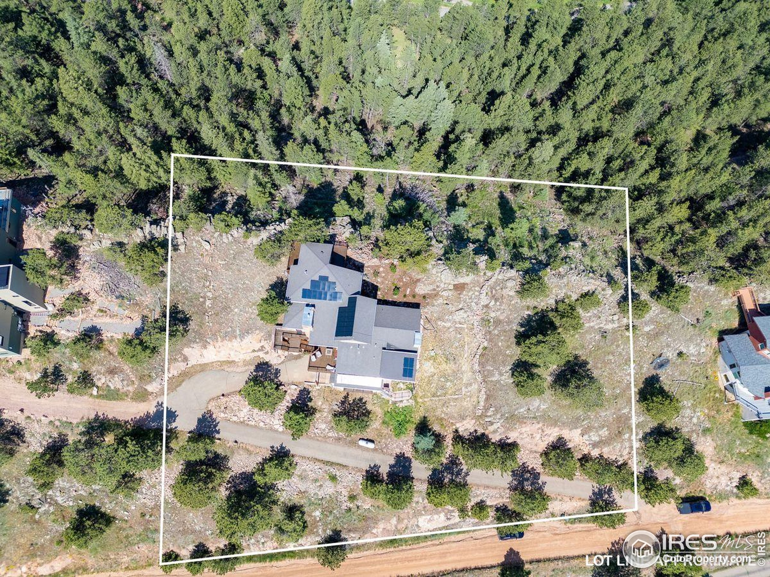 6183 Red Hill Road Boulder, CO 80302 - Photo 26 of 34 an aerial view of a house with a yard