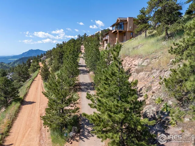 a picture of a bench in front of a window