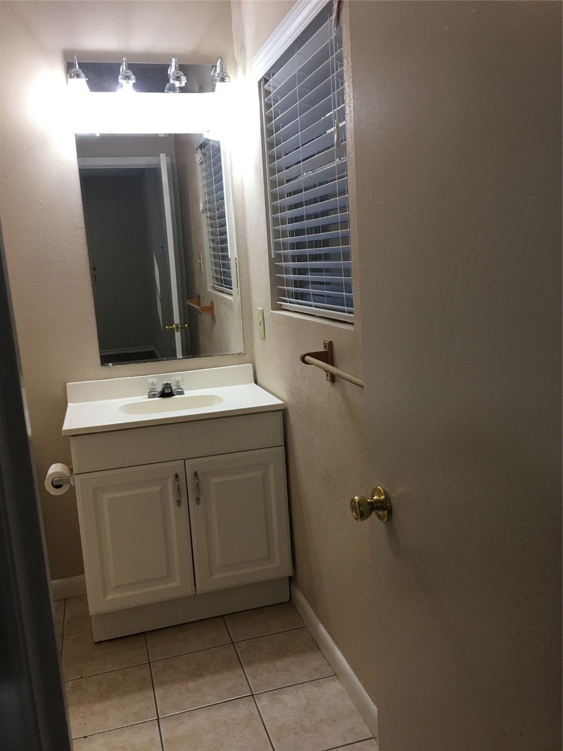 2283 McCaleb Road Montgomery, TX 77316 - Photo 21 of 45 a bathroom with a sink vanity and mirror