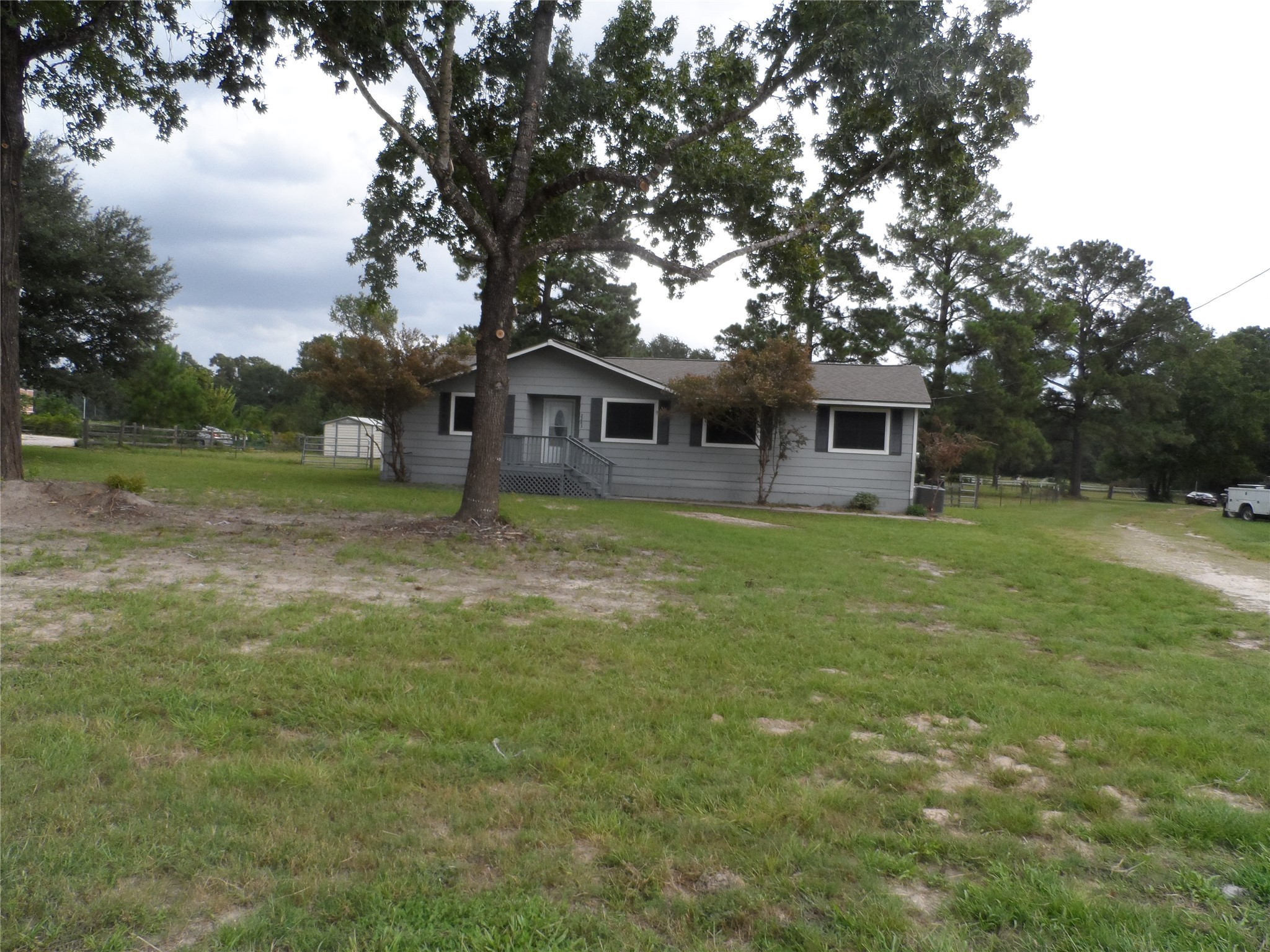2283 McCaleb Road Montgomery, TX 77316 - Photo 44 of 45 a view of a house with a yard