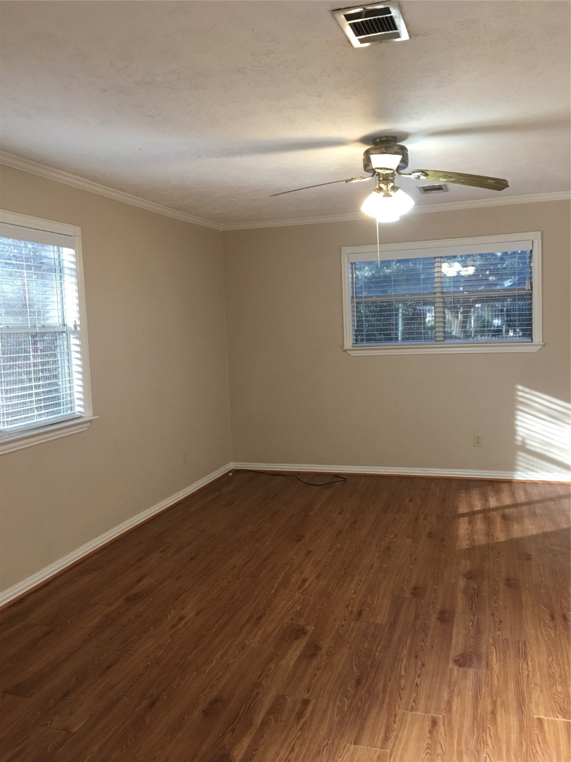 2283 McCaleb Road Montgomery, TX 77316 - Photo 5 of 45 a view of a room with wooden floor