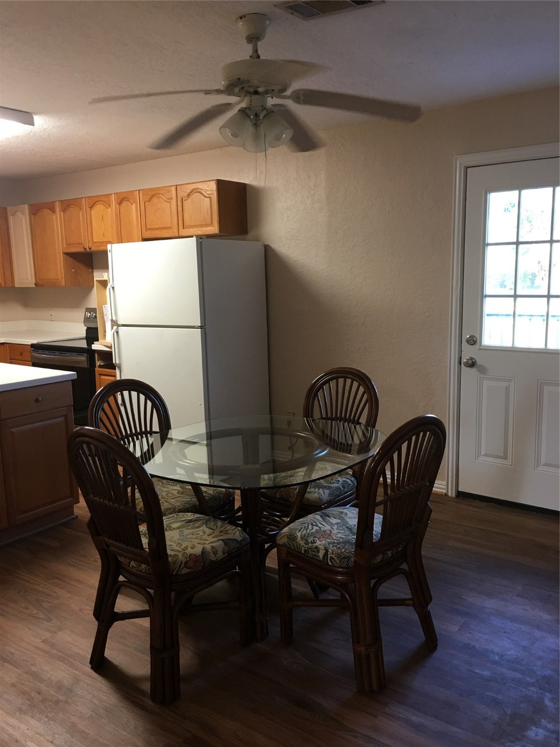 2283 McCaleb Road Montgomery, TX 77316 - Photo 10 of 45 a view of a dining room with furniture and wooden floor
