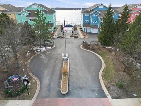 a view of a patio with a table and chairs