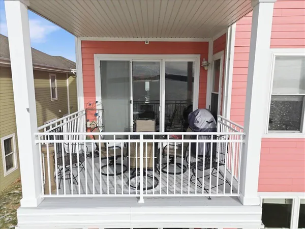 a view of a swimming pool and a yard