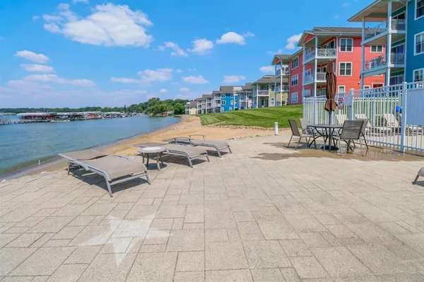 a view of a water fountain in front of a house