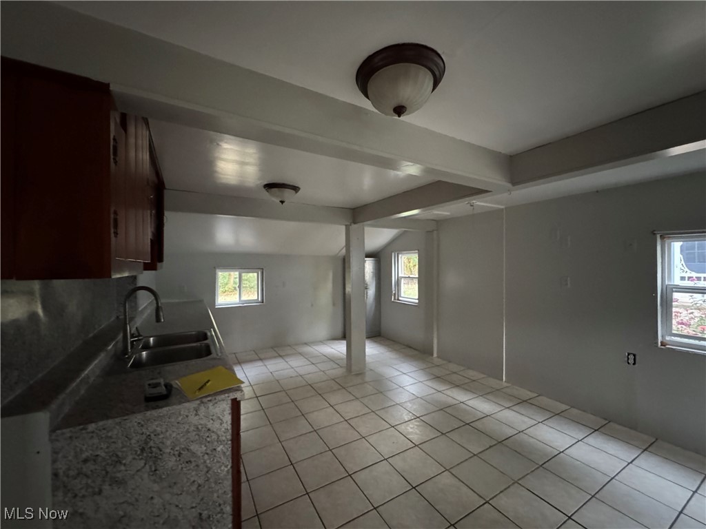 2360 Scio Road Carrollton, OH 44615 - Photo 16 of 22 Kitchen with sink and light tile patterned floors