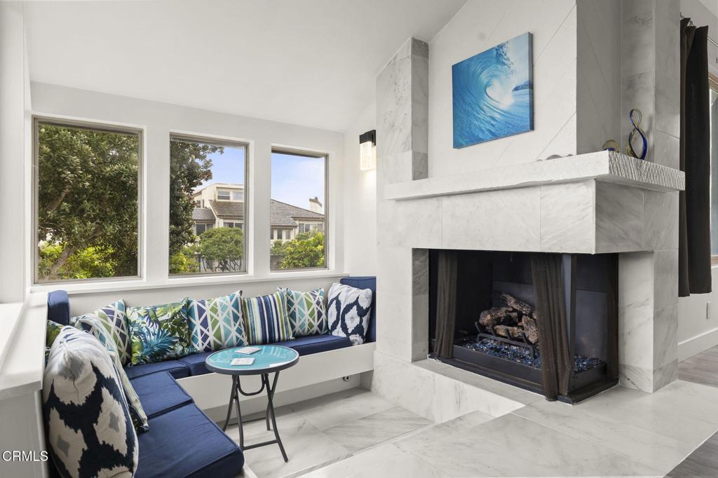 3464 Sunset Lane Oxnard, CA 93035 - Photo 15 of 46 a living room with furniture and a fireplace