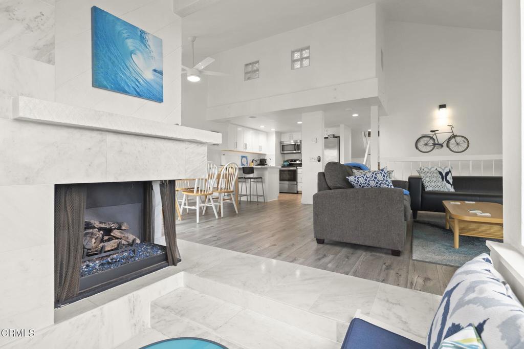 3464 Sunset Lane Oxnard, CA 93035 - Photo 17 of 46 a living room with furniture and a fireplace