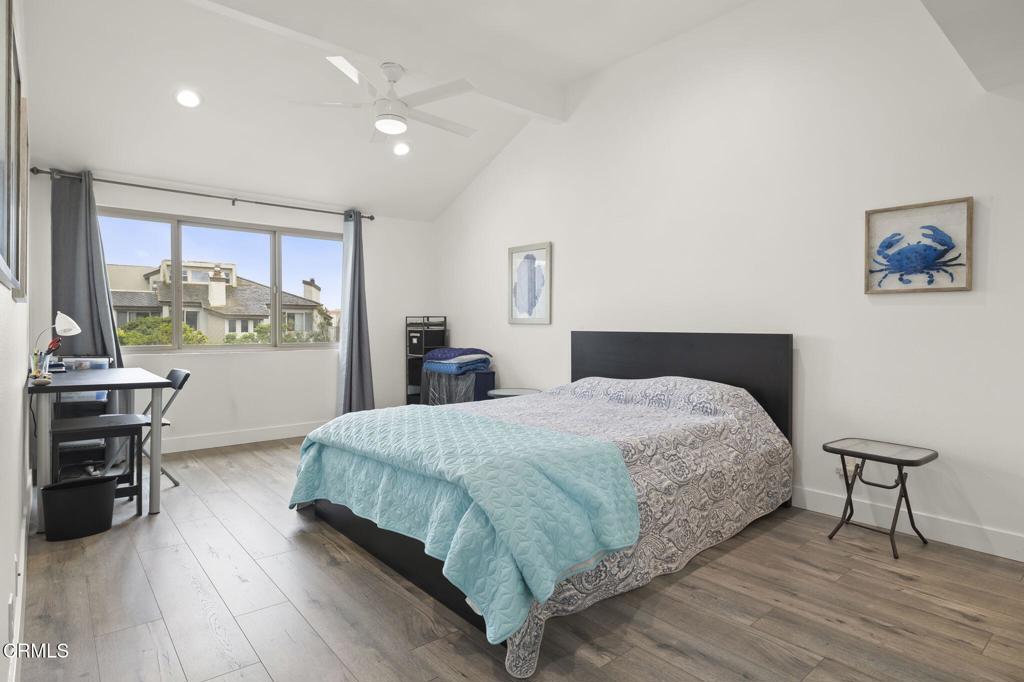 3464 Sunset Lane Oxnard, CA 93035 - Photo 23 of 46 a bedroom with a bed and a flat tv screen on the dresser