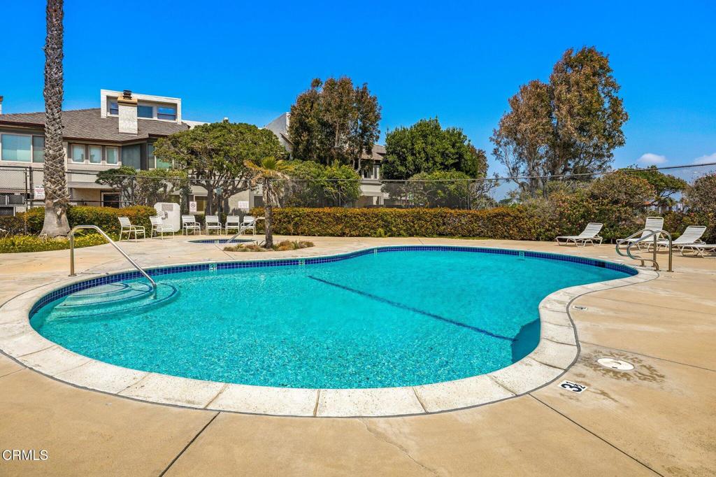 3464 Sunset Lane Oxnard, CA 93035 - Photo 33 of 46 a view of a swimming pool with a patio