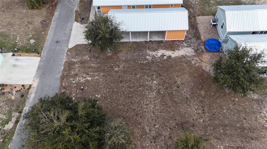 0 Southwest 879th Street Steinhatchee, FL 32359 - Photo 8 of 10 a view of a house with a yard and tree
