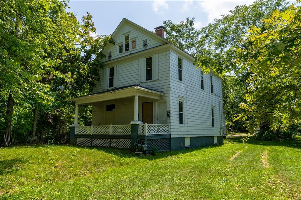 949 West Decatur Street Decatur, IL 62522 - Photo 1 of 1 a front view of a house with a yard