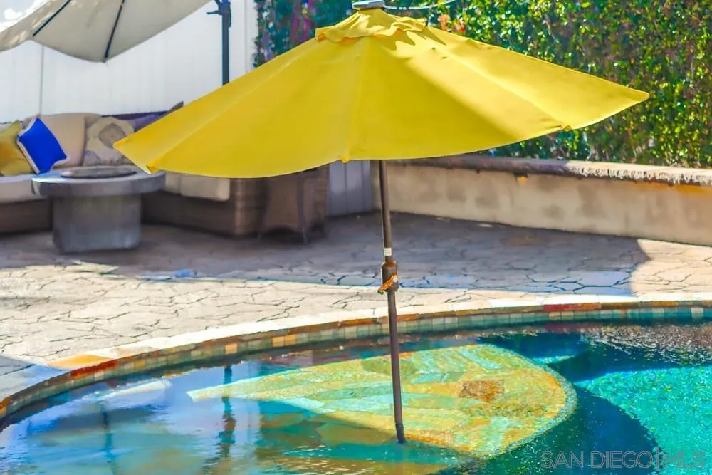 40 Bahama Bend Coronado, CA 92118 - Photo 1 of 36 a view of a swimming pool with an outdoor space