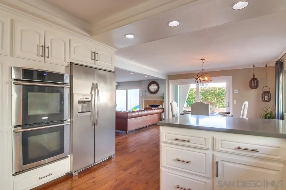 40 Bahama Bend Coronado, CA 92118 - Photo 13 of 36 a kitchen with counter top space and stainless steel appliances